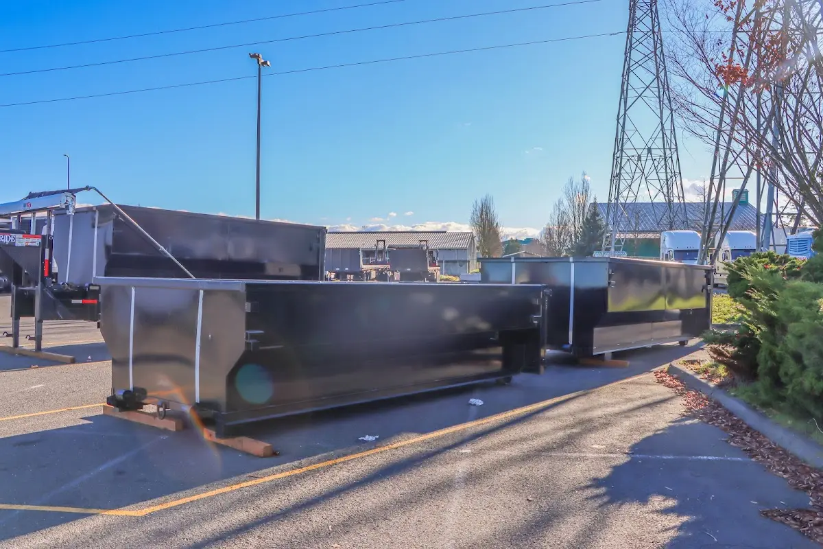 Roll-off dumpster ready for waste disposal at job site for Concrete Dumpster Rental in Boulder City